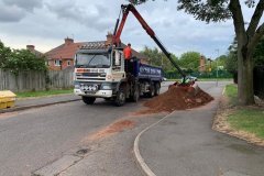 grab-hire-collecting-building-waste